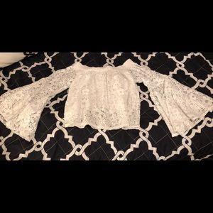 Cropped white lace top with flowy sleeves